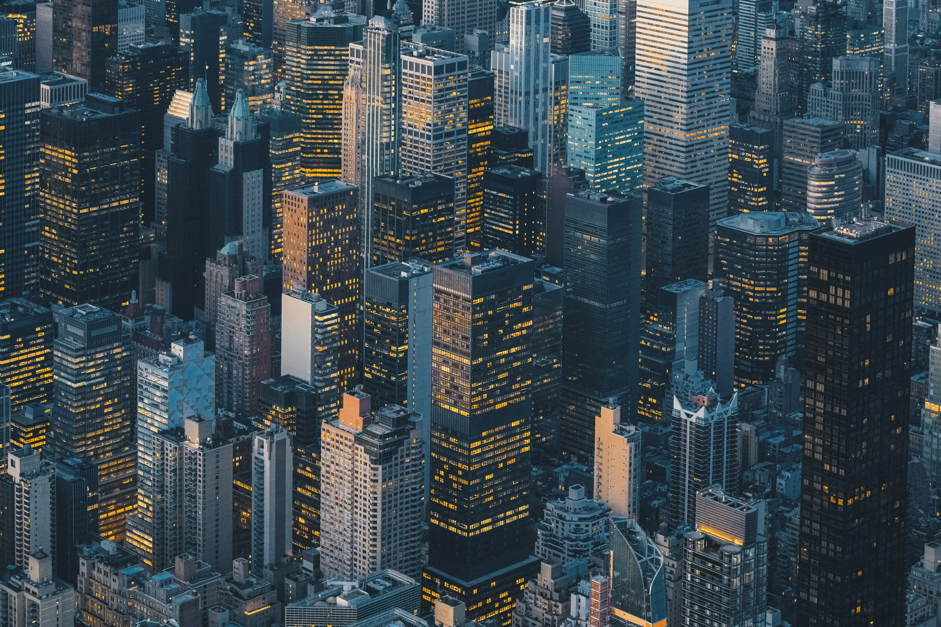 Aerial view of New York City skyline at sunset,
